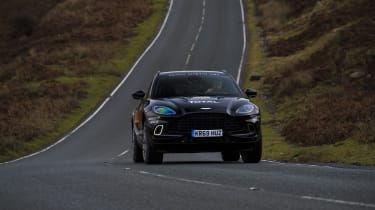 Aston Martin DBX prototype driving on Welsh road