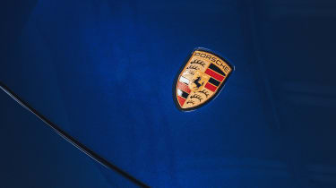 2020 Porsche Taycan - front badge close up 