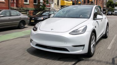 Tesla Model Y SUV front 3/4 tracking