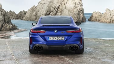 BMW M8 Competition coupe - rear view static 