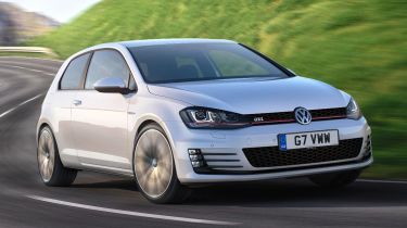 Volkswagen Golf GTI hatchback 2013 front quarter on road