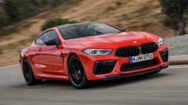 BMW M8 Competition coupe front 3/4 tracking