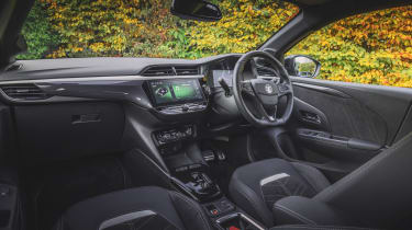Vauxhall Corsa Electric facelift UK drive interior side
