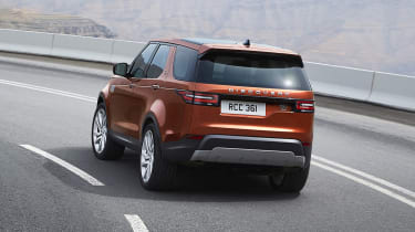 2016 Land Rover Discovery driving - rear view