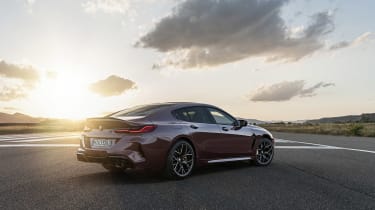 BMW M8 Gran Coupe parked on a runway