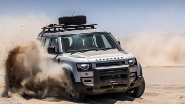 Land Rover Defender SUV off-road sand