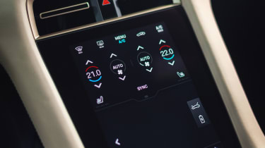 2020 Porsche Taycan - front centre console air conditioning close up 