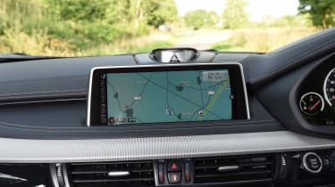 The infotainment system is easy to use thanks to BMW's iDrive controller, and features internet services
