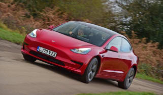 Tesla Model 3 saloon fron 3/4 cornering