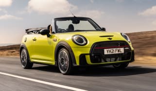 2021 MINI Convertible driving with roof down