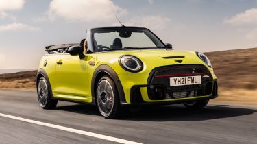 2021 MINI Convertible driving with roof down
