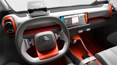 The gear selector is moved to a switch behind the steering wheel