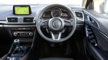 The Mazda3 dashboard is modern and well put together