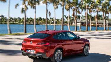 BMW X4 tracking shot, rear right