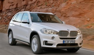 BMW X5 SUV 2013 front quarter tracking