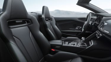 The interior has Nappa leather seats with optional green stitching