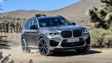 BMW X3 M Competition SUV cornering off-road