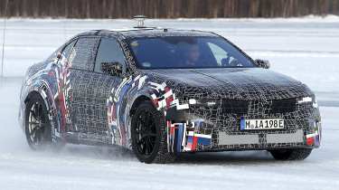 BMW M3 electric spy shot front quarter