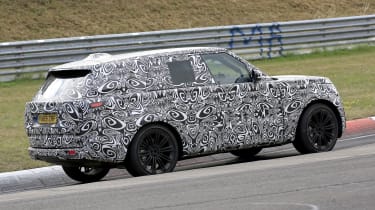 2022 Range Rover - rear 3/4 view passing 