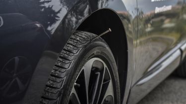 Tyre with nail stuck in the sidewall