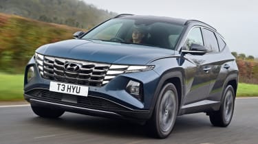 Hyundai Tucson SUV front 3/4 tracking
