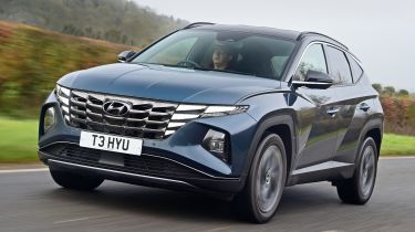 Hyundai Tucson SUV front 3/4 tracking