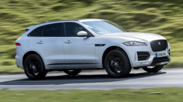 2016 Jaguar F-Pace driving - side