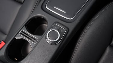 The Comand infotainment system is controlled by a wheel on the console