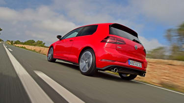 Twin tailpipes and tinted rear light clusters help set the Golf GTI apart from other versions in the range