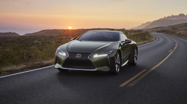 Lexus LC Limited Edition driving in front of sunset