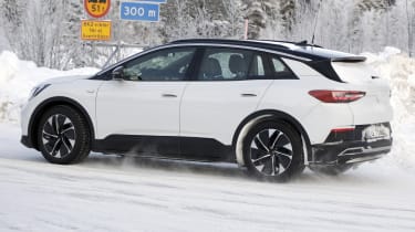 2021 Volkswagen ID.4 SUV - winter testing side on view passing 