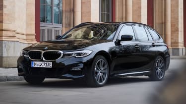 2020 BMW 330e Touring - front 3/4 view