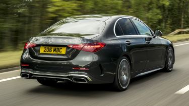 Mercedes C-Class saloon driving - rear view